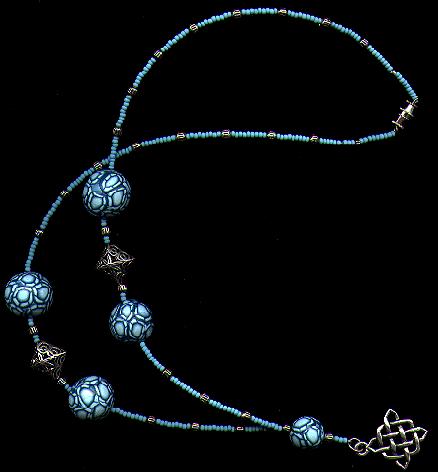[Necklace with shaded millefiori beads and silver knot pendant - 21K]