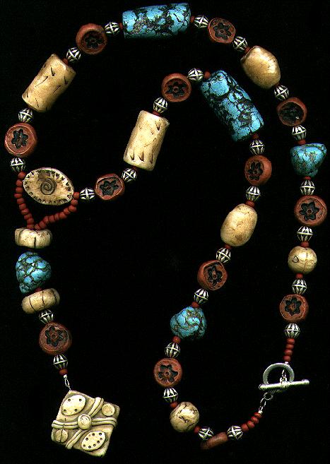 [A necklace of turquoise chunks, terra cotta, and ivory polymer clay - 50K]